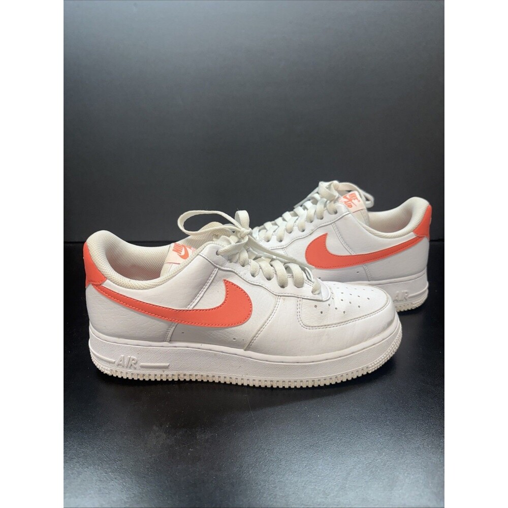 Nike White Low-Top Sneakers with Coral Orange Swoosh